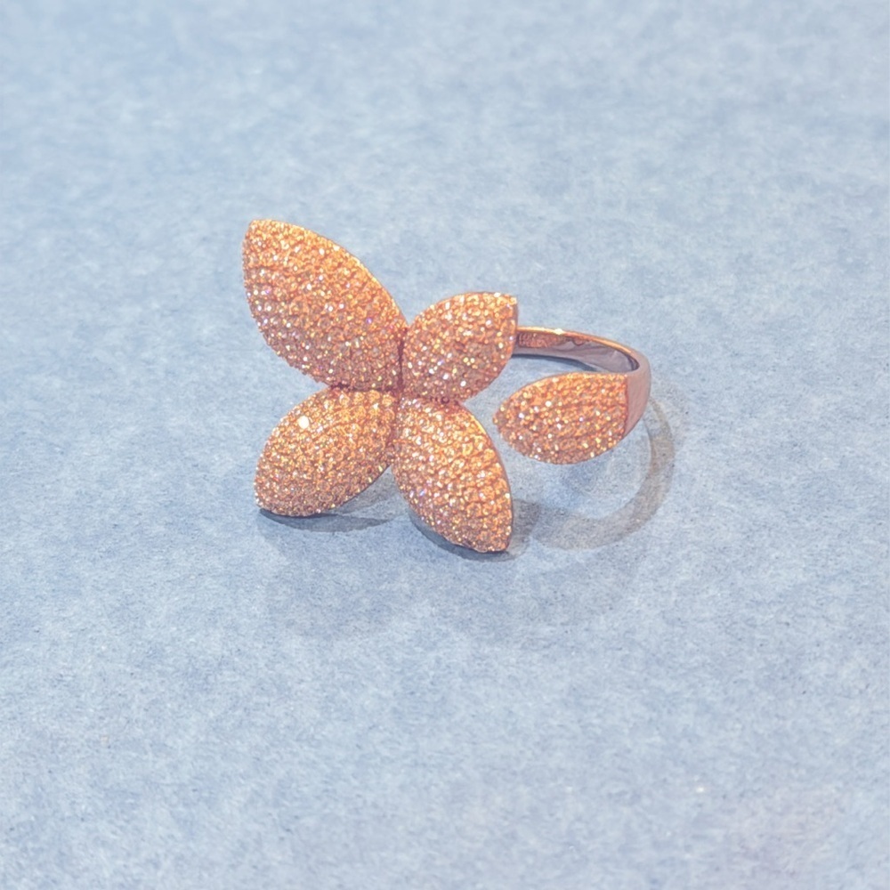 Elegant Rose Gold Floral Ring set on a sterling silver base. - Picture 7 of 11